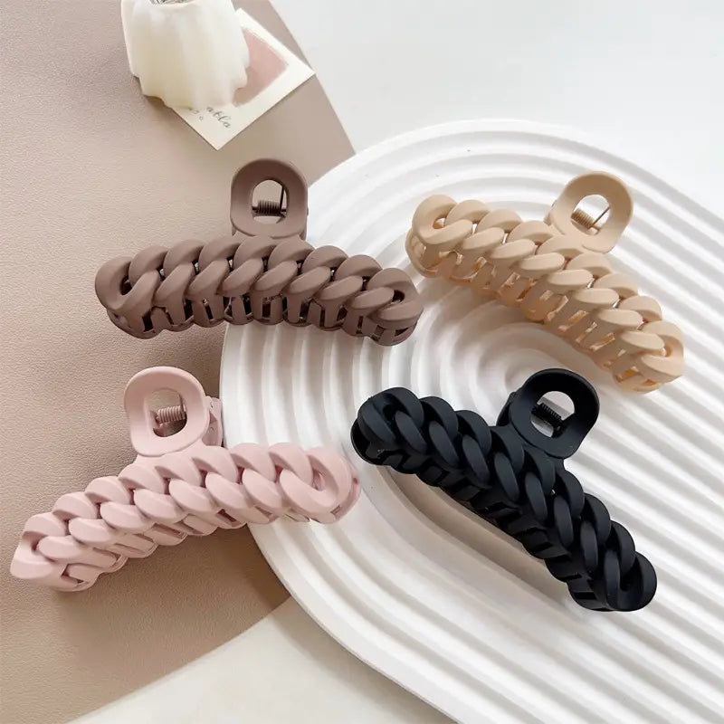 Brown, Tan, Pink, and Black Twist Plastic Claw Clips