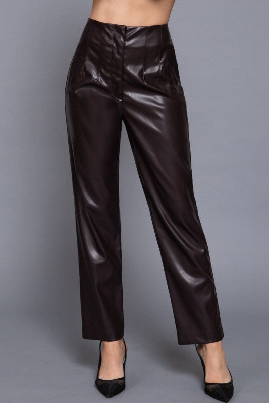 Black leather pants on a gray background