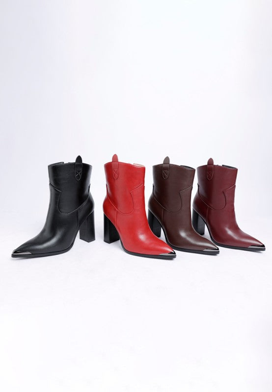 Four pairs of leather boots in black, red, brown, and burgundy on a white background