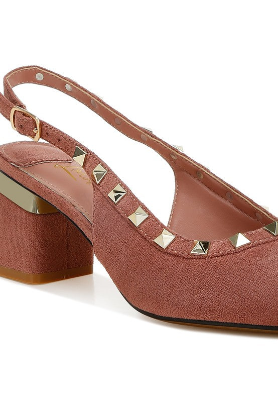 Brown suede shoe with gold studded details on a white background