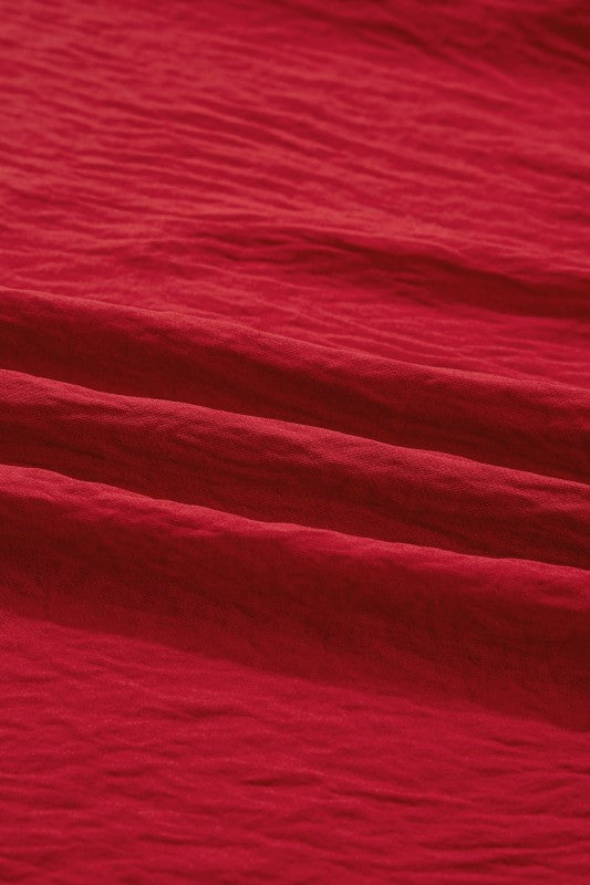 Close-up of red fabric with visible texture