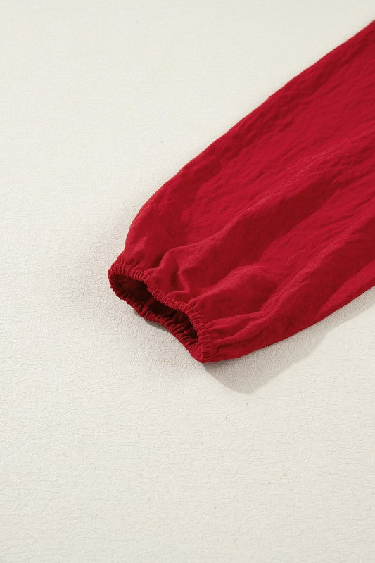 Red fabric on a beige background