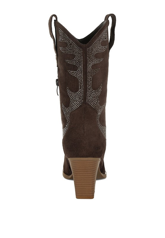 Black cowboy boot with decorative pattern on a white background