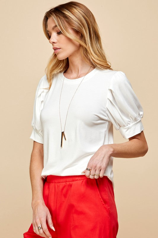 Feeling Sweet Tee with Crew Neckline and Puffed, Pleated Short Sleeves and Relaxed Bodice Color White.